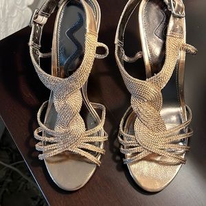 Rose gold, braided worn once; 4 inch heel